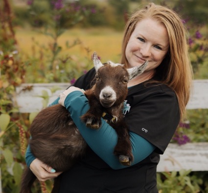 Women with goats